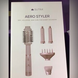 Pink Hair Styling Tool with Versatile Attachments